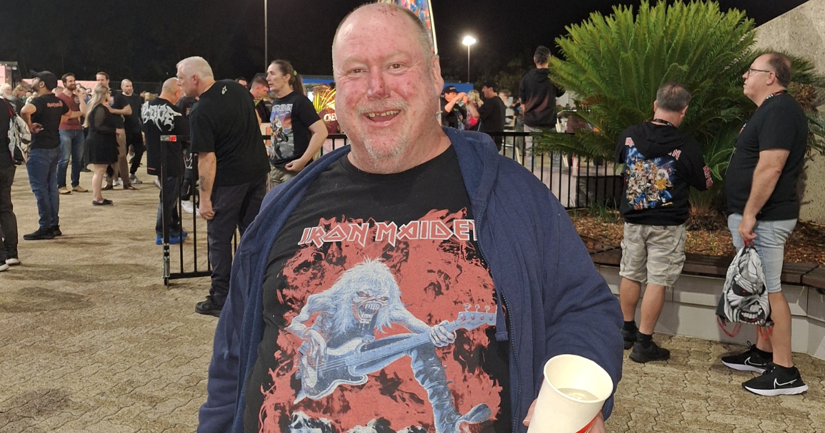 Jay our client smile at Iron Maiden concert