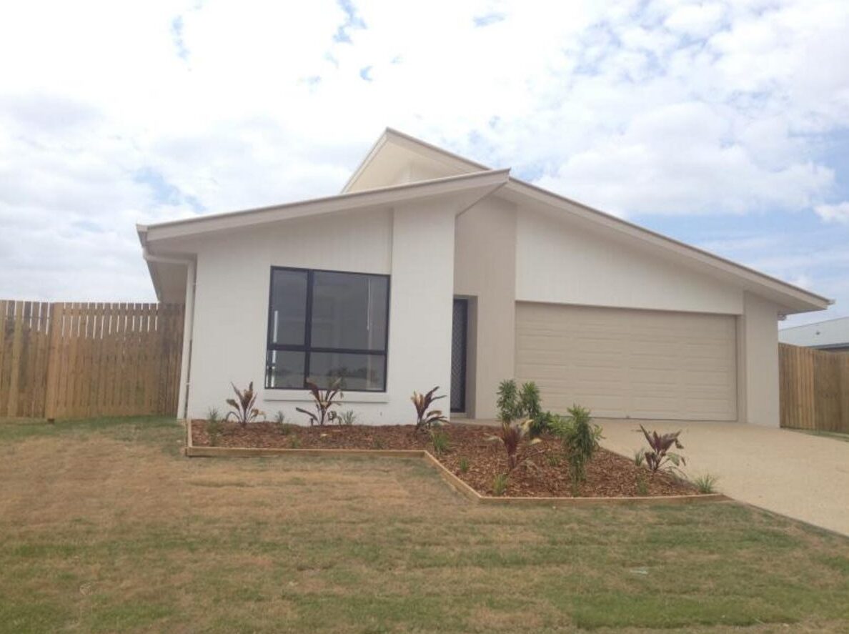 Modern, accessible exterior of a Warm and Inviting SIL Home in Parkhurst, 32 Vermont Drive, Parkhurst Qld 4702, featuring wide driveway, low-maintenance garden, and contemporary design, part of Australia’s leading disability accommodation provider.