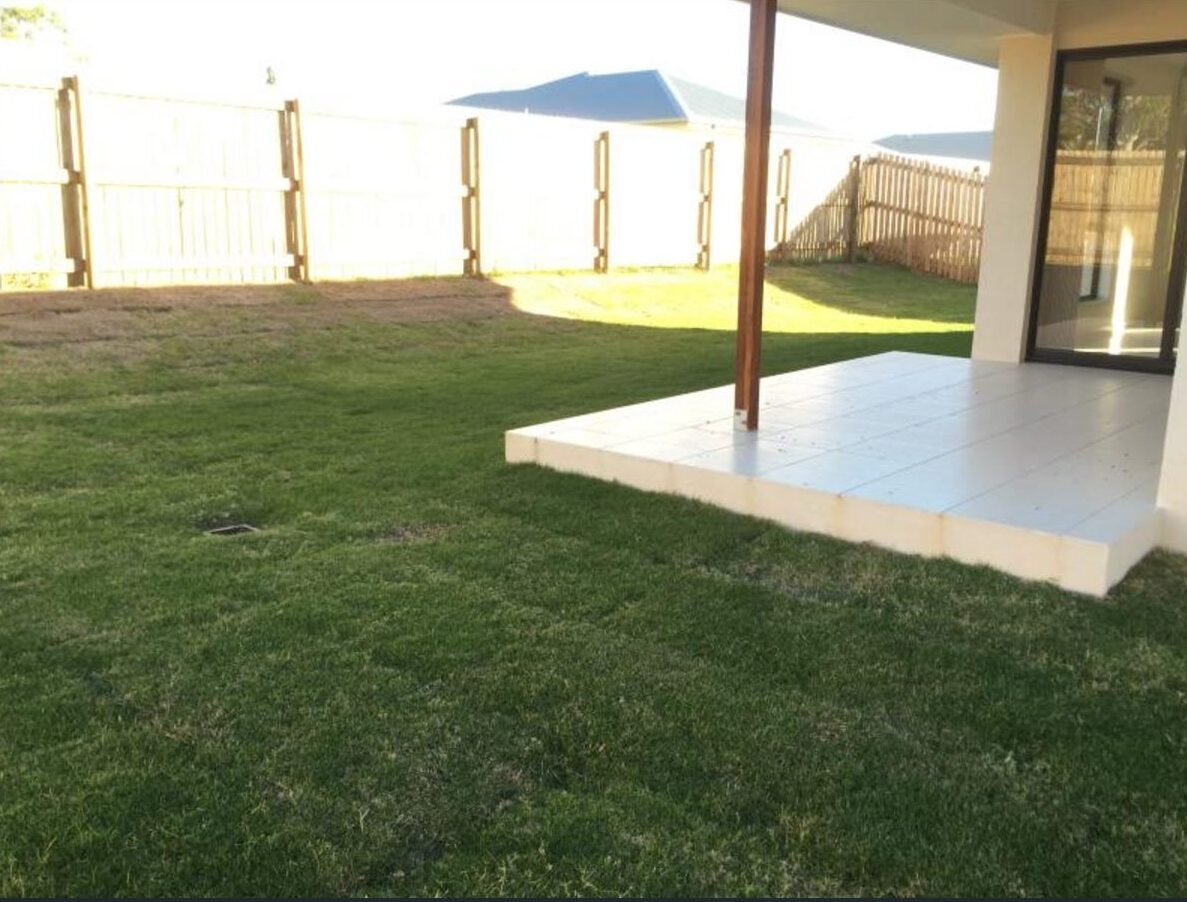 Accessible backyard with covered patio in a Warm and Inviting SIL Home in Parkhurst, 32 Vermont Drive, Parkhurst Qld 4702, part of Australia’s leading disability accommodation provider.