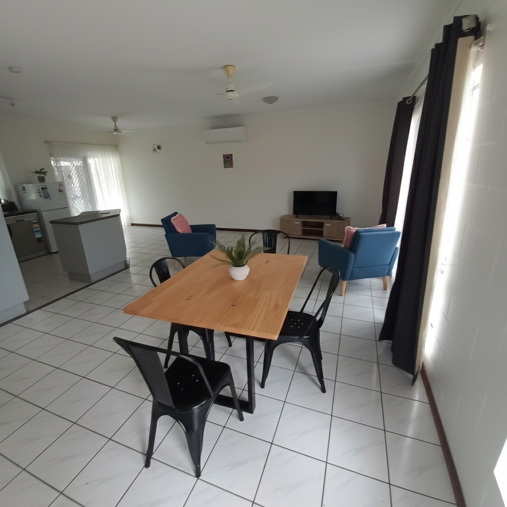 Spacious, airy living and dining area in a Spacious and Airy SIL home south of Cairns, 7 Royal Saxon Close, Mount Sheridan 4686, part of Australia’s leading disability accommodation provider.