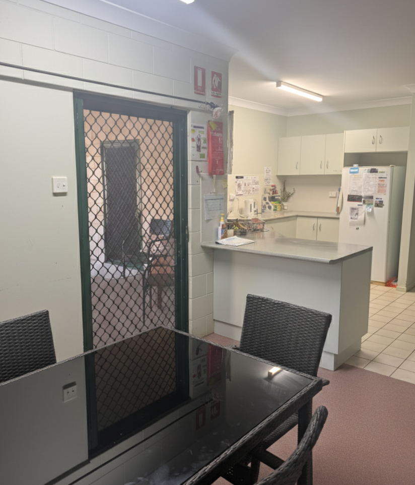 Functional, accessible kitchen and dining area in a Central and Roomy SIL home in Mareeba, 6 Kylie Close, Mareeba 4880, part of Australia’s leading disability accommodation provider.